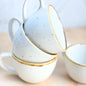 Cera White Ceramic Tea Cup Set of 4 | Handcrafted Office Tea Cup with Brown Rim
